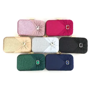 Elegant women evening clutch bag with rhinestone and glitter satin design for party use.