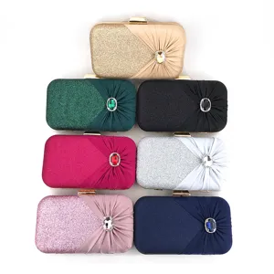 Elegant women rhinestone evening clutch bag detail showing multi-color glitter satin finish.