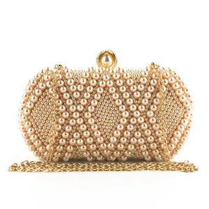Elegant handmade pearl evening clutch bag with gold chain for women party and wedding events.