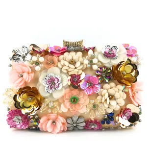 Handmade 3D floral beaded evening clutch bag detail, sparkling sequin crystal party purse.