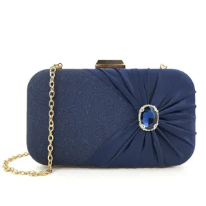 Elegant dark blue evening clutch bag with pleated satin, gold chain and sparkling rhinestone gem.