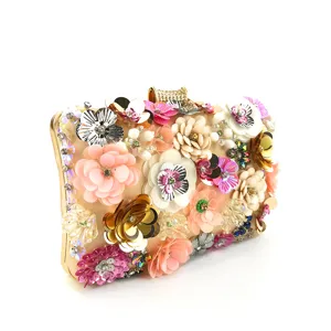 Exquisite handmade 3D floral beaded evening clutch bag, detailed close-up showing sequin texture.
