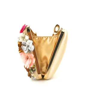Elegant gold evening clutch bag with handmade colorful floral sequins and metallic frame details.