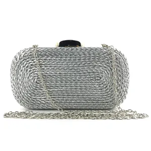 Silver woven PU clutch bag for women, elegant evening bag with metallic chain strap.