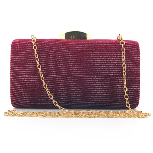 Elegant burgundy velvet evening clutch bag with sparkling glitter and gold chain strap.