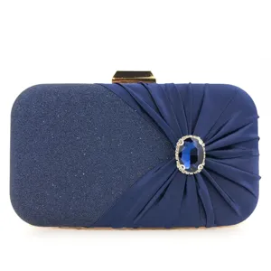 Dark blue evening clutch bag with glitter, pleated fabric and blue crystal rhinestone brooch.