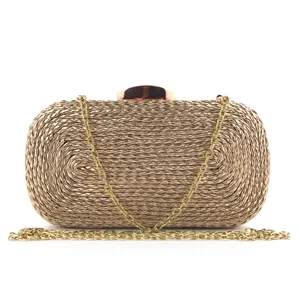 Metallic gold hand woven evening clutch bag with chain strap and metal clasp detail.