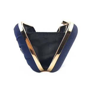 Elegant dark blue evening clutch bag with gold metal frame and black lining for party use.