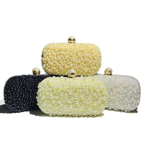 Elegante handgemaakte parel clutch voor dames, perfect voor avondfeesten, bruiloften en banketten.