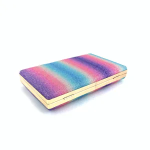 Glitter rainbow evening clutch bag for women, stylish hard box purse with gold frame details.