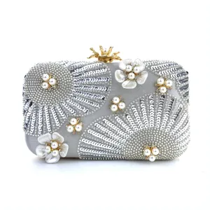 Elegant silver sequin pearl clutch bag, ideal for wedding banquets and evening parties.
