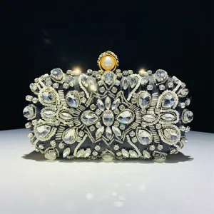 Rhinestone crystal evening clutch detail, sparkling beaded handbag close-up, luxury accessory