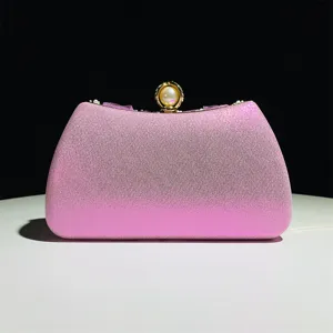 Elegant pink evening clutch bag with pearl clasp for women wedding party banquet dress.