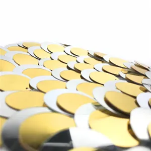 Stunning gold and silver gradient sequin detail for evening clutch bag, sparkling fish scale design.