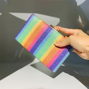 Stunning rainbow glitter clutch bag for women, sparkling hard case evening bag with gold clasp.
