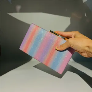 Gradient sequin clutch bag for women, elegant evening party purse with gold hardware shine.