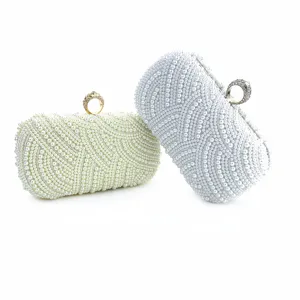 Elegant pearl evening clutch bag for women, stylish wedding party handbag with ring handle.