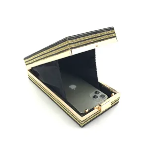 Detailed view of a sparkling crystal evening clutch bag showcasing its spacious interior.