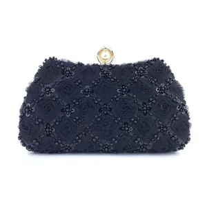 Handmade floral beaded evening clutch bag detail view, elegant black wedding party purse.