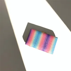 Elegant rainbow sequin clutch bag for women, perfect for evening parties and weddings.