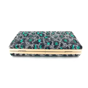 Pochette de soirée léopard en sequins avec cadre métallique doré pour femme fête.