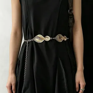 Gold metal waist chain belt for women, unique twisted design fashion dress accessory.