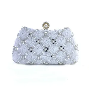 Elegant white handmade floral beaded evening clutch bag with pearl clasp for women banquet party.