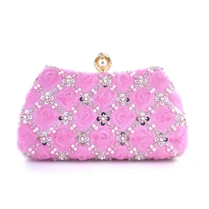 Elegant pink handmade beaded mesh flower evening clutch bag with luxury pearl metal clasp.