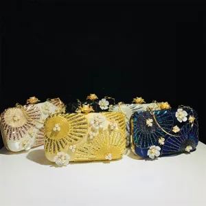 Fashion sequin pearl evening clutch bag with elegant flower design and metal chain strap.