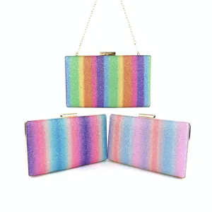 Rainbow glitter clutch bag for women, sparkling evening party handbag with chain detail.