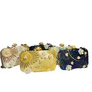Elegant beaded sequin evening clutch bag with pearl flower decorations, perfect for wedding party.