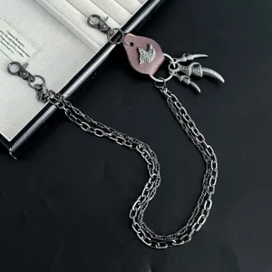 Punk doppelte Metall Hosenkette mit Adlerklaue Anhänger für coolen Streetwear Stil.