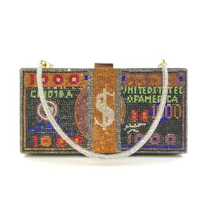 Rhinestone dollar bill clutch bag detail, sparkling crystal evening purse with chain.