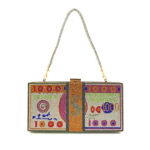 Rhinestone dollar bill clutch bag detail, sparkling crystal evening bag close up display.