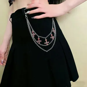 Multi-layer metal pants chain with red cross pendants, hip-hop style fashion waist chain.