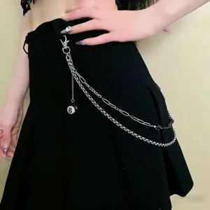 Punk style multi-layer metal pants chain with black 8-ball pendant for hip-hop fashion look.
