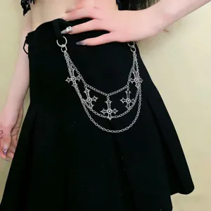 Detailed shot of multi-layer cross pant chain, gothic hip-hop metal waist chain accessory.