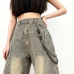 Gothic cross tassel pants chain detail, punk hip hop streetwear accessory, retro distressed denim pants.