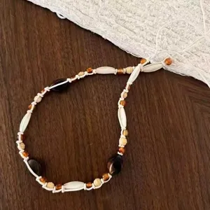 Bohemian braided beaded waist chain with wooden and amber beads, vintage ethnic style belt.