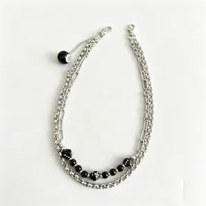 Trendy hip-hop punk multi-layer metal pants chain with 8-ball and dice pendant accessories.