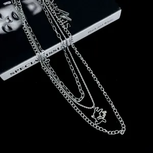 Multi-layer silver chain pants chain with cute cartoon rabbit pendant, punk hip-hop style jewelry.