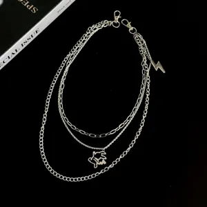 Multi-layer silver pants chain with cute rabbit and lightning pendants, punk street waist chain.