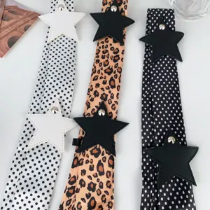 Cintura a nastro vintage con pois e leopardato con stelle accessori moda donna