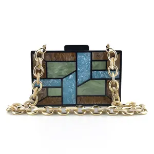 Sac de soirée pochette géométrique en acrylique avec chaîne épaisse pour fête femme.