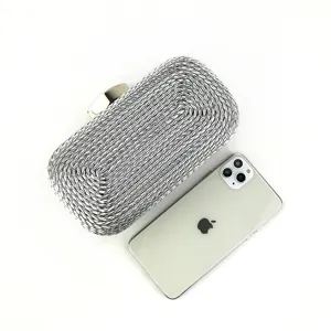 Handmade woven PU leather evening clutch bag for women, elegant hard case bridal handbag.