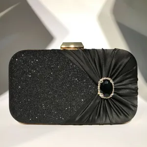 Exquisite rhinestone evening clutch bag for women, featuring glitter and pleated satin details.