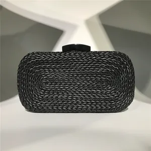 Black woven PU leather evening clutch bag detail view, elegant hard case box purse for women.