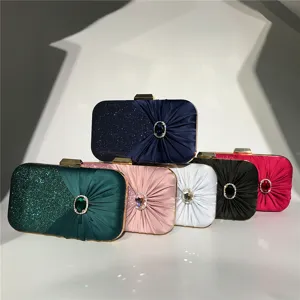 Exquisite pleated satin evening clutch bag with sparkling crystal rhinestone centerpiece.