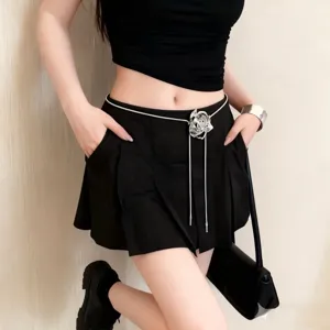 Metal flower waist chain detail, minimalist cool style tassel belt accessory for women.