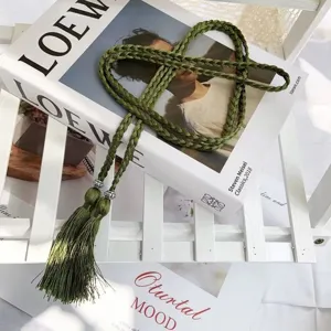 Green braided rope belt with tassels and metal beads, Bohemian style decorative accessory.